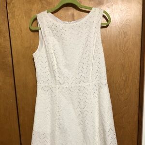 White sleeveless dress with pockets